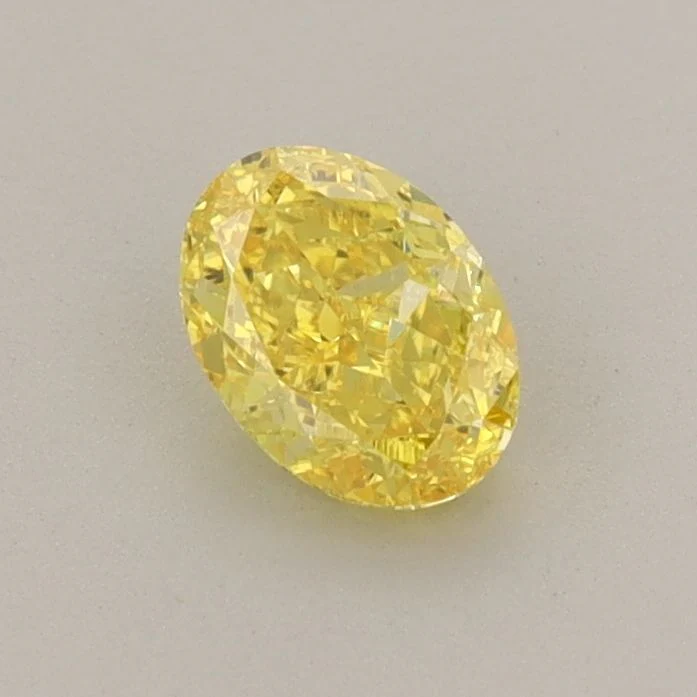 0.55 ct. Fancy Vivid Yellow/VS1 Oval Lab Grown Diamond