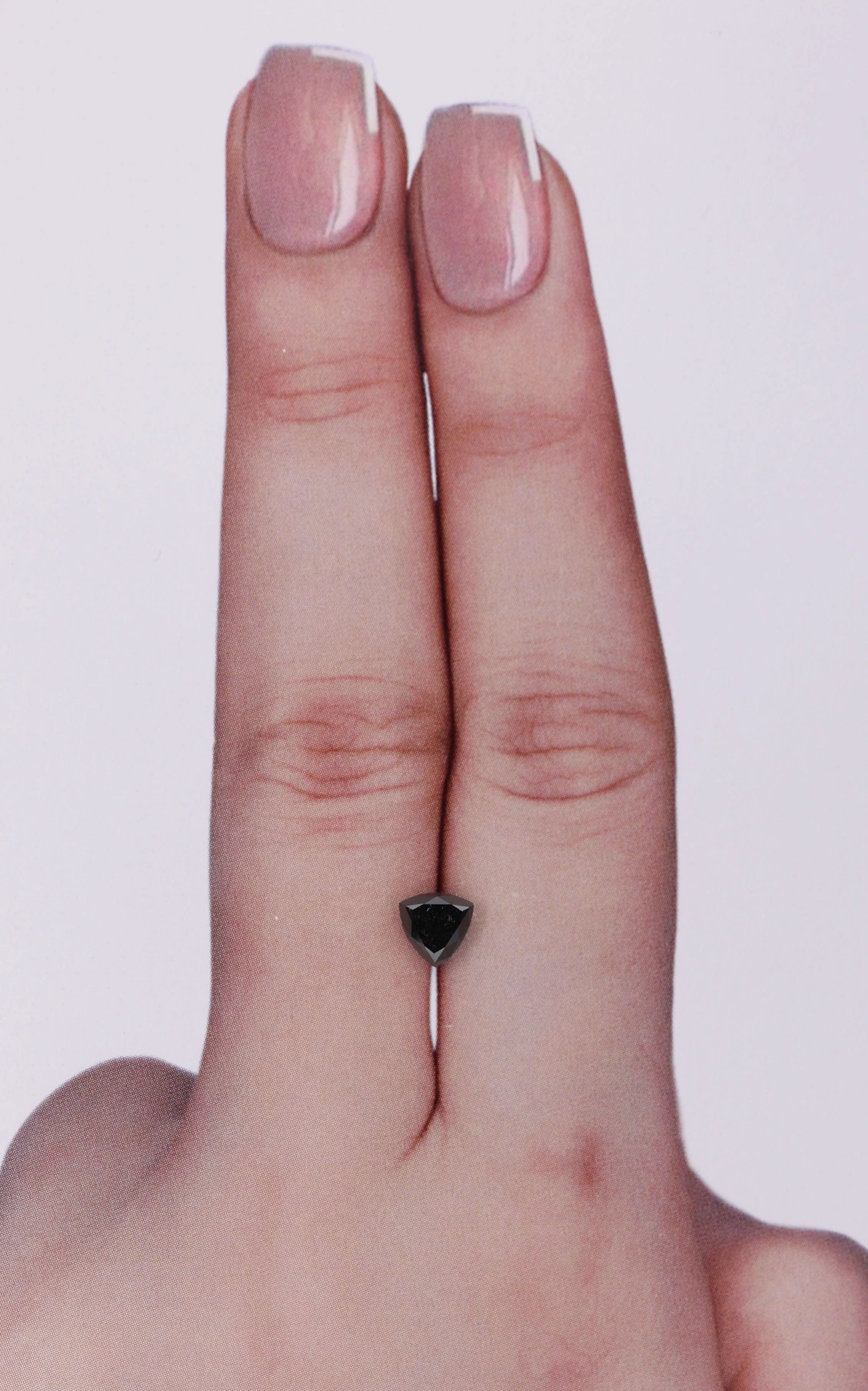 0.57 ct. Fancy Black/ Trilliant Diamond