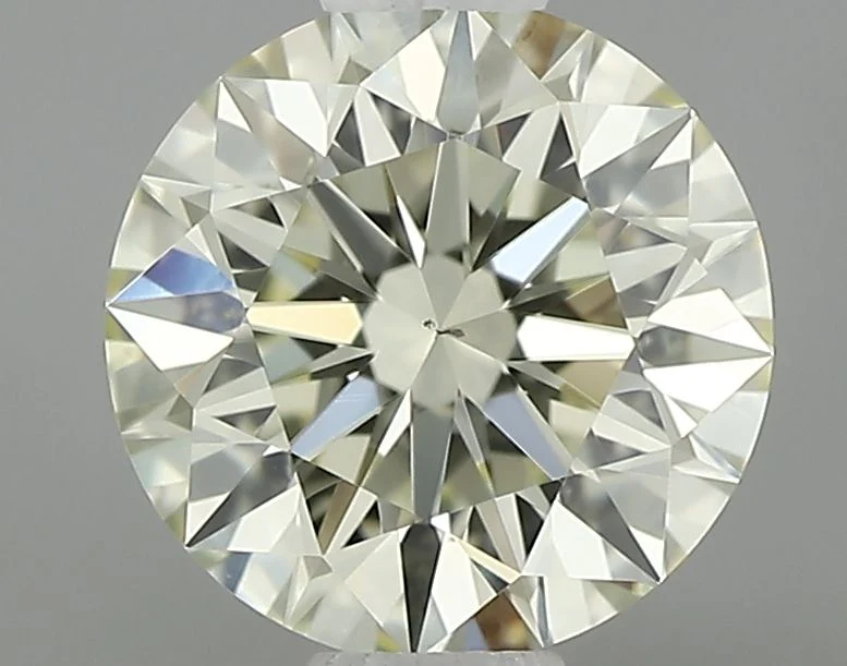 0.57 ct. Q-R/VS2 Round Diamond
