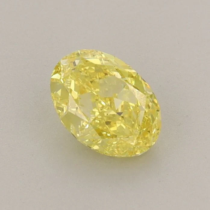0.61 ct. Fancy Vivid Yellow/VVS2 Oval Lab Grown Diamond