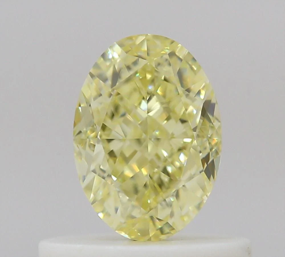 0.61 ct. Fancy Yellow/VVS2 Oval Diamond