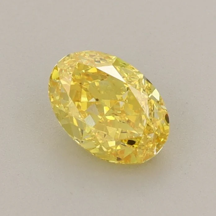 0.66 ct. Fancy Vivid Yellow/VVS2 Oval Lab Grown Diamond