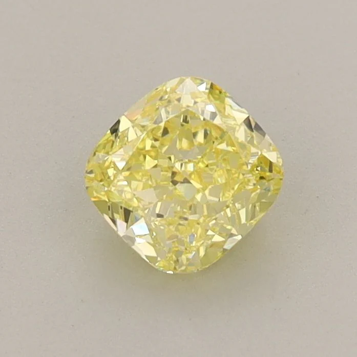 0.67 ct. Fancy Vivid Yellow/VVS2 Cushion Modified Lab Grown Diamond