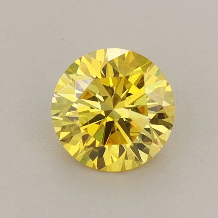 0.70 ct. Fancy Vivid Yellow/VS2 Round Lab Grown Diamond