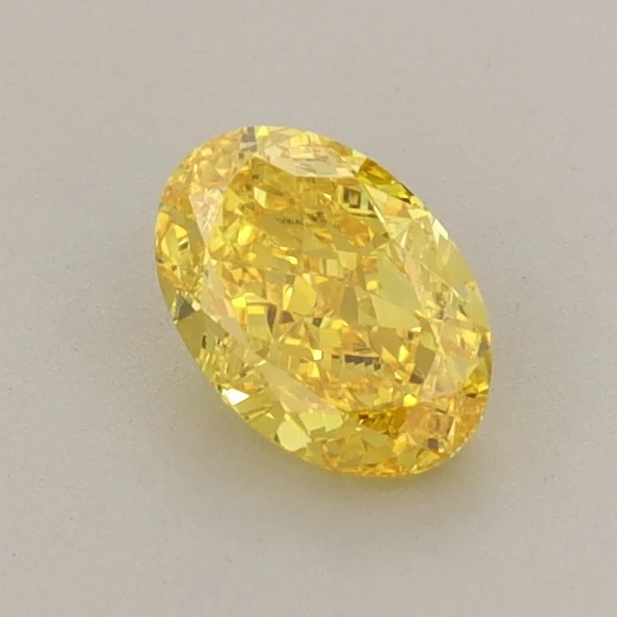0.72 ct. Fancy Vivid Yellow/VVS2 Oval Lab Grown Diamond