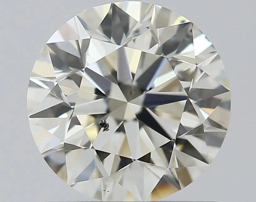 0.77 ct. L/SI2 Round Diamond