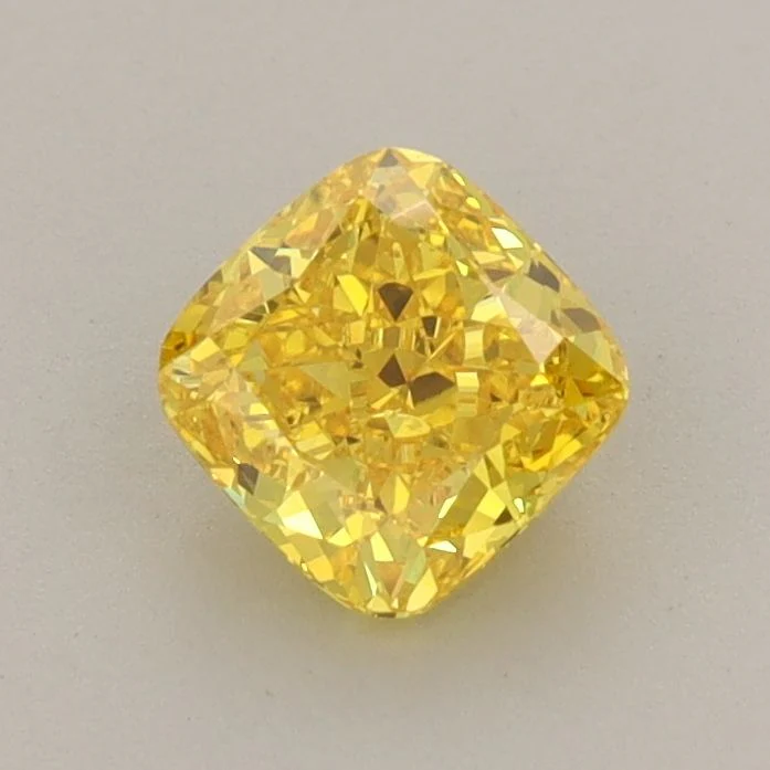 0.79 ct. Fancy Vivid Yellow/VVS2 Cushion Modified Lab Grown Diamond