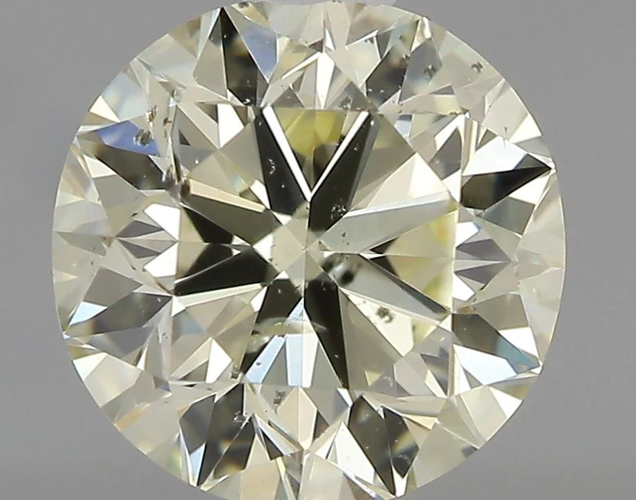 0.80 ct. U-V/SI2 Round Diamond