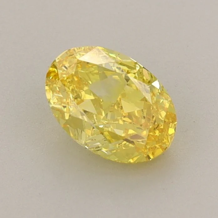 0.81 ct. Fancy Vivid Yellow/VVS1 Oval Lab Grown Diamond