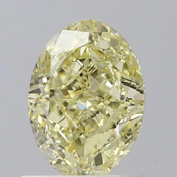 0.81 ct. Fancy Yellow/VS2 Oval Diamond