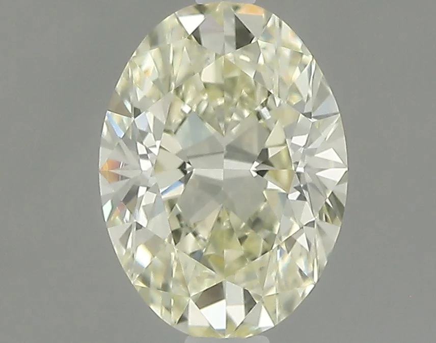 0.86 ct. Fancy Yellow/VVS2 Oval Diamond