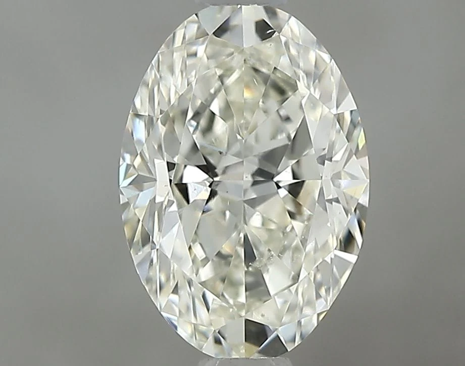 0.90 ct. K/VS2 Oval Diamond
