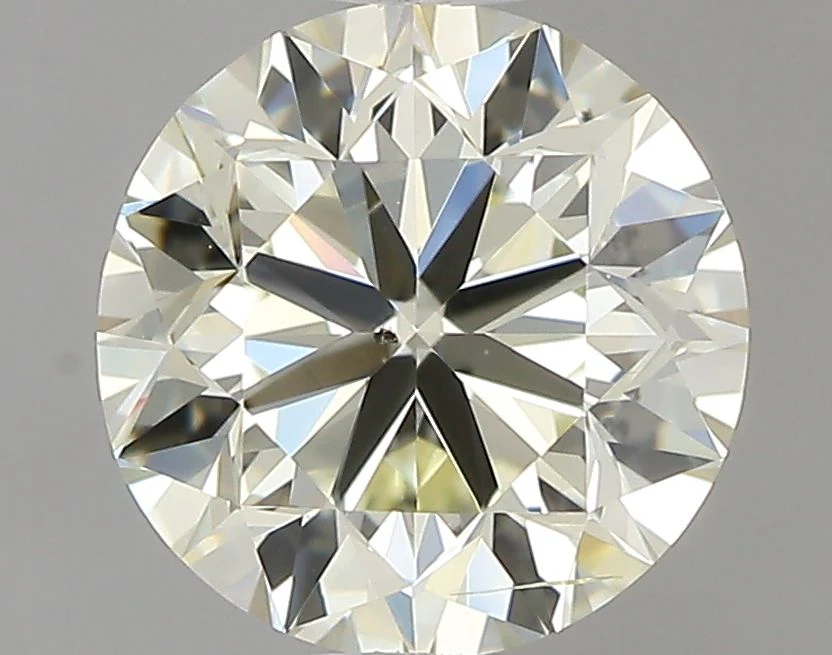 0.90 ct. M/SI1 Round Diamond
