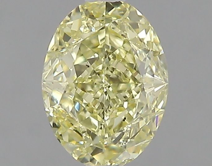 0.91 ct. Fancy Yellow/SI1 Oval Diamond
