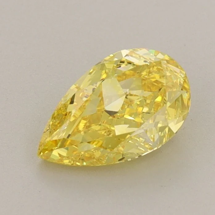 0.94 ct. Fancy Vivid Yellow/VVS2 Pear Lab Grown Diamond