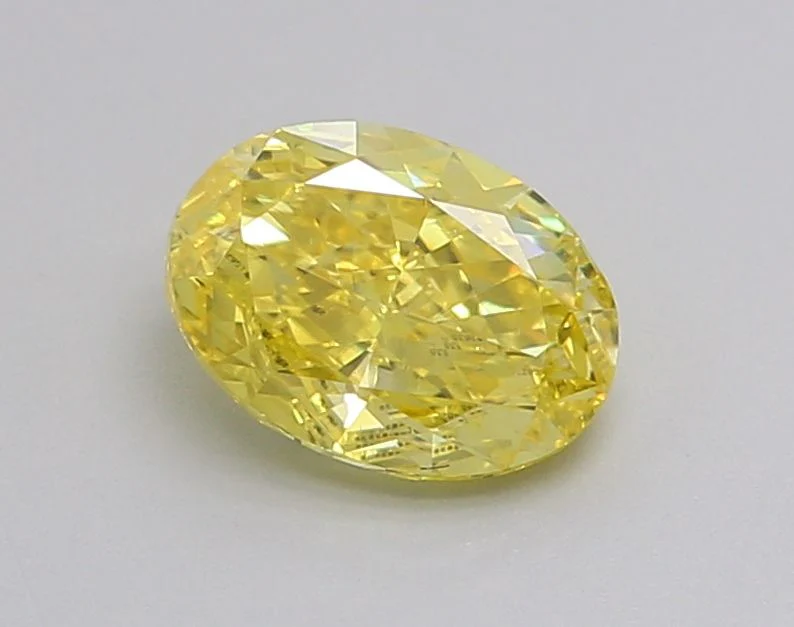 0.98 ct. Fancy Vivid Yellow/VS2 Oval Lab Grown Diamond