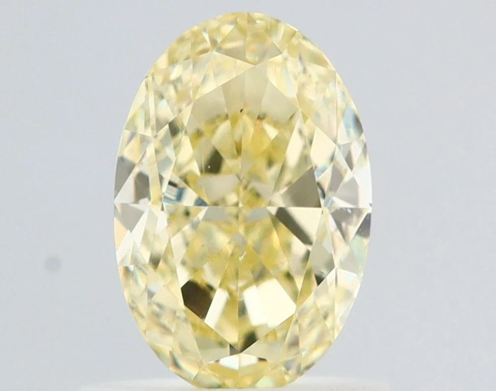0.99 ct. Fancy Light Yellow/VS2 Oval Diamond
