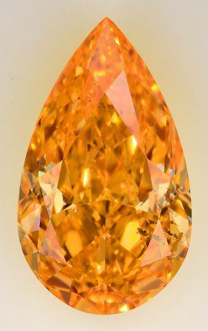 1.02 ct. Fancy Vivid Yellowish Orange/SI1 Pear Diamond