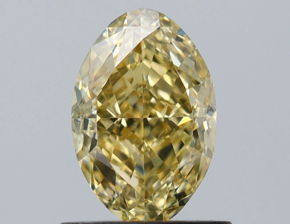 1.03 ct. Fancy Yellow/VS1 Oval Diamond