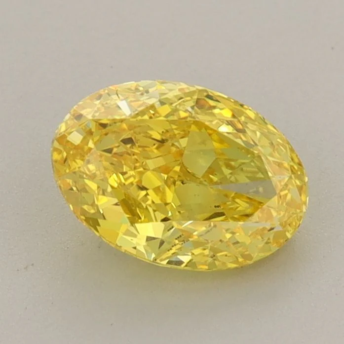 1.06 ct. Fancy Vivid Yellow/VVS2 Oval Lab Grown Diamond