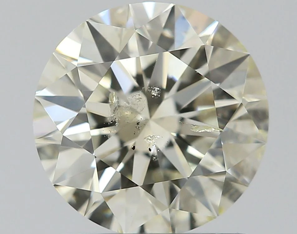 1.06 ct. M/SI2 Round Diamond