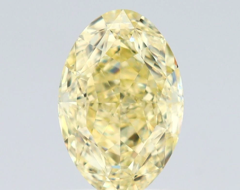 1.08 ct. Fancy Yellow/VS1 Oval Diamond