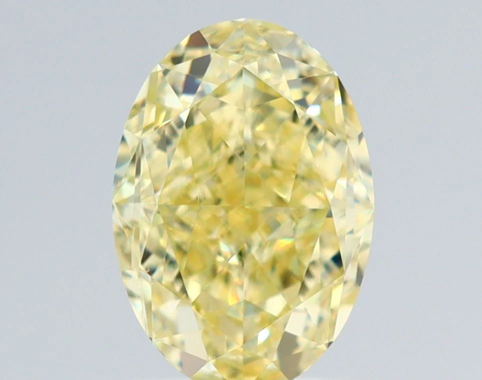 1.13 ct. Fancy Yellow/VS1 Oval Diamond