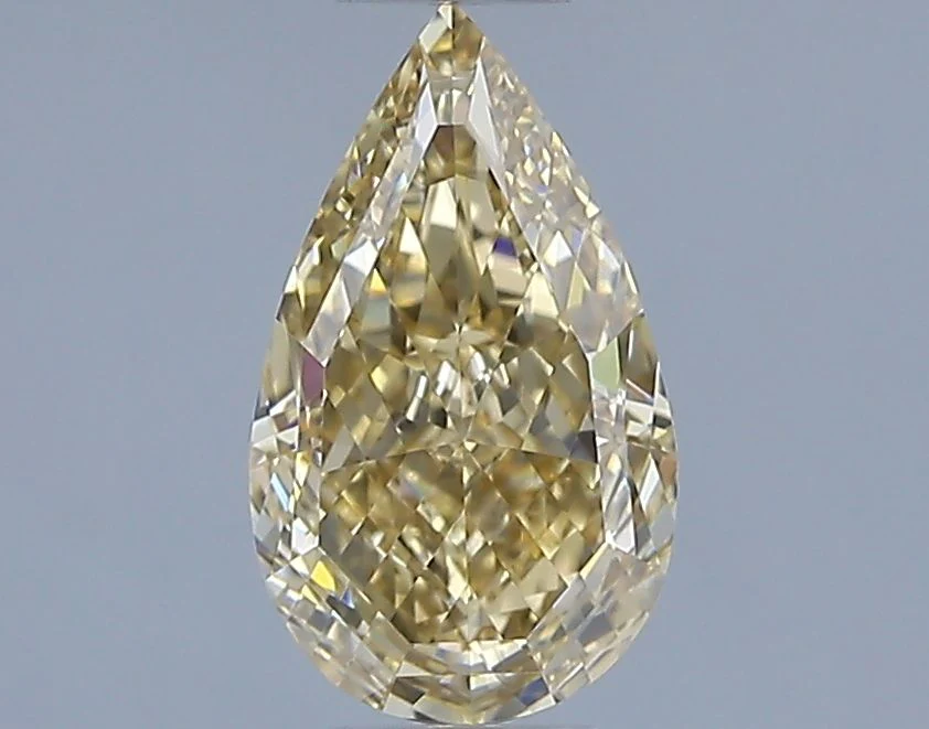 1.13 ct. Fancy Yellow/VVS1 Pear Diamond