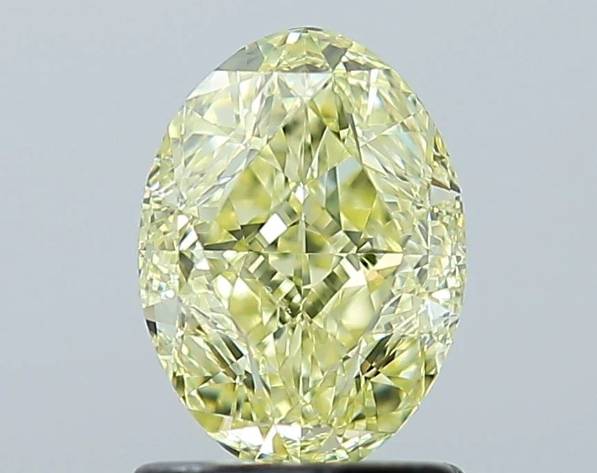1.41 ct. Fancy Yellow/VS1 Oval Diamond