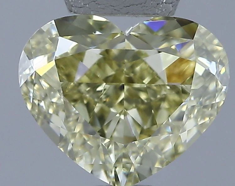 1.51 ct. Fancy Yellow/VVS2 Heart Diamond