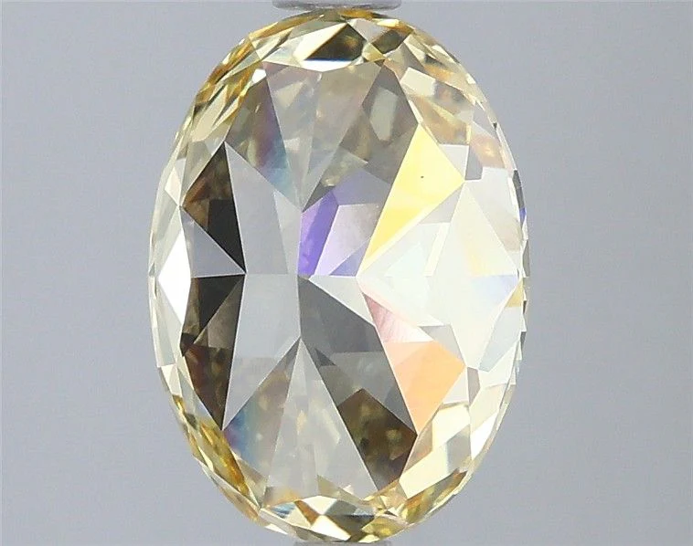 3.03 ct. Fancy Vivid Yellow/VS1 Oval Lab Grown Diamond